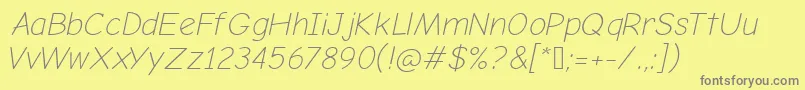 ComicNeueLightOblique-fontti – harmaat kirjasimet keltaisella taustalla