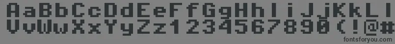 Pixeloperatormono8Bold-Schriftart – Schwarze Schriften auf grauem Hintergrund
