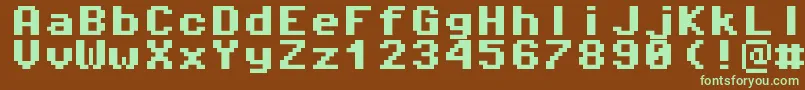 Pixeloperatormono8Bold-fontti – vihreät fontit ruskealla taustalla