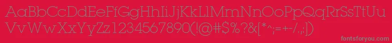 フォントLugaextralightc – 赤い背景に灰色の文字