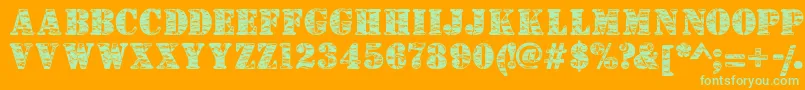 フォントCamouflagej – オレンジの背景に緑のフォント