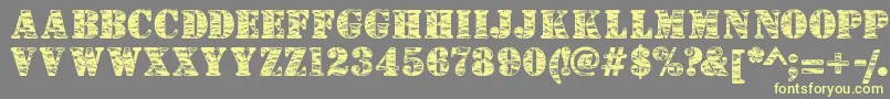 Camouflagej Font – Yellow Fonts on Gray Background