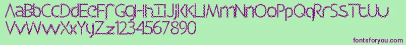 Barbalicious-fontti – violetit fontit vihreällä taustalla