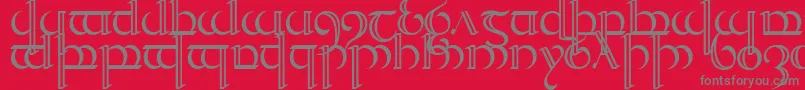Quencap2-fontti – harmaat kirjasimet punaisella taustalla