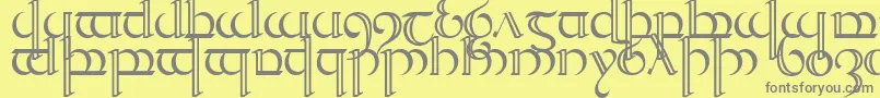 フォントQuencap2 – 黄色の背景に灰色の文字