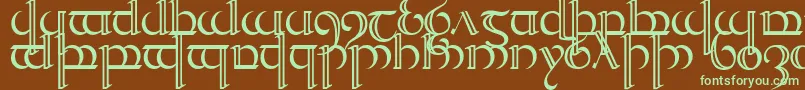 フォントQuencap2 – 緑色の文字が茶色の背景にあります。