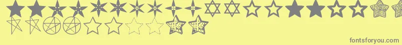 Saiba mais sobre a fonte EstrellassTfb Fonte EstrellassTfb – fontes cinzas em um fundo amarelo