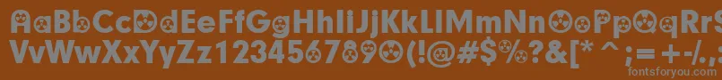 RadiationParticipants-fontti – harmaat kirjasimet ruskealla taustalla