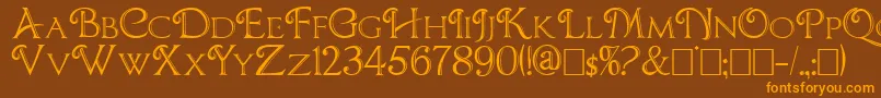 フォントCBoxD – オレンジ色の文字が茶色の背景にあります。
