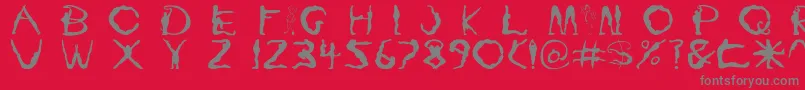 Yoga1-fontti – harmaat kirjasimet punaisella taustalla