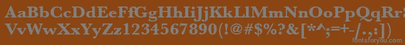 Urwbaskertextbolwid-fontti – harmaat kirjasimet ruskealla taustalla