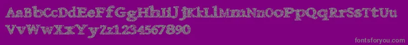 Danishcrack-fontti – harmaat kirjasimet violetilla taustalla