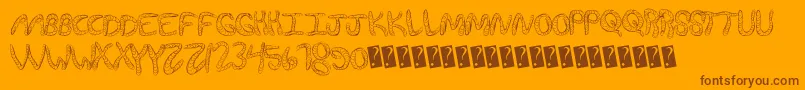 Lisätietoja Wurmfun-fontista Wurmfun-fontti – ruskeat fontit oranssilla taustalla