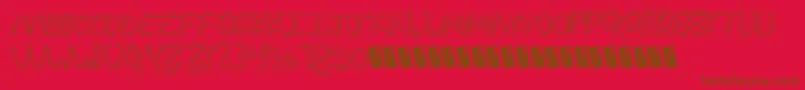 Fonte Wurmfun – fontes marrons em um fundo vermelho