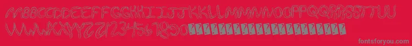 Wurmfun-Schriftart – Graue Schriften auf rotem Hintergrund