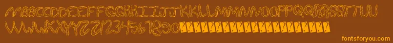 Wurmfun-Schriftart – Orangefarbene Schriften auf braunem Hintergrund