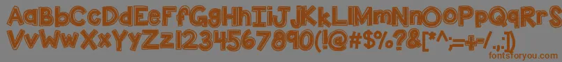 Kbdunktank Font – Brown Fonts on Gray Background