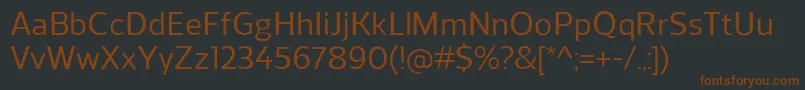 Шрифт ReganMedium – коричневые шрифты на чёрном фоне