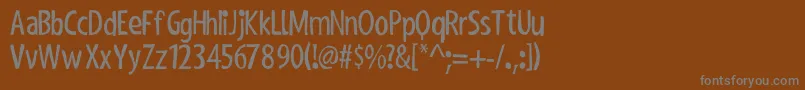 ShakyHandSomeComic Font – Gray Fonts on Brown Background