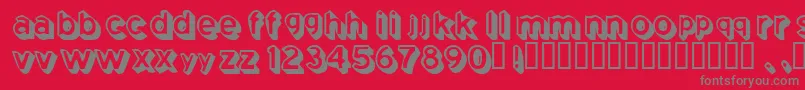 Fonte Coming – fontes cinzas em um fundo vermelho