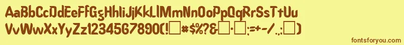 フォントOregondryPlainRegular – 茶色の文字が黄色の背景にあります。