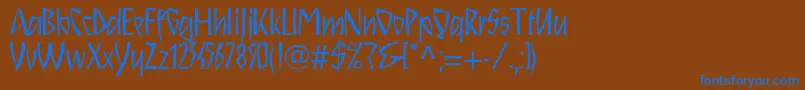 Schnitzll-Schriftart – Blaue Schriften auf braunem Hintergrund