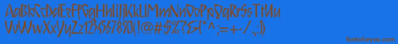 フォントSchnitzll – 茶色の文字が青い背景にあります。