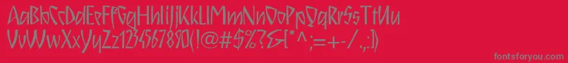 Schnitzll-fontti – harmaat kirjasimet punaisella taustalla