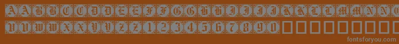 Gothiccornercaps-fontti – harmaat kirjasimet ruskealla taustalla