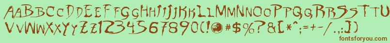 Dinobots Font – Brown Fonts on Green Background