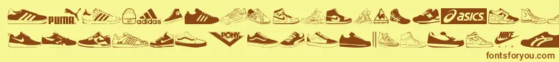 フォントSneakers – 茶色の文字が黄色の背景にあります。