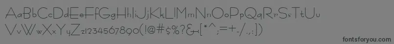 フォントFastrac ffy – 黒い文字の灰色の背景