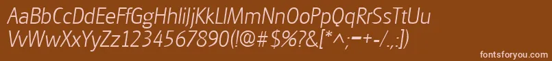 GouditaSansLightSfItalic-fontti – vaaleanpunaiset fontit ruskealla taustalla