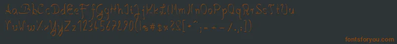 Шрифт SalkinHandschrift – коричневые шрифты на чёрном фоне