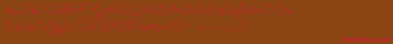 SalkinHandschrift Font – Red Fonts on Brown Background