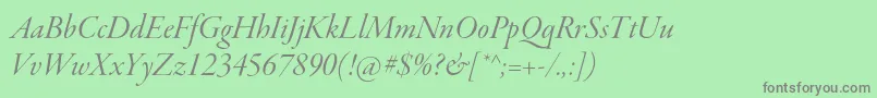 GaramondpremrproItdisp-fontti – harmaat kirjasimet vihreällä taustalla