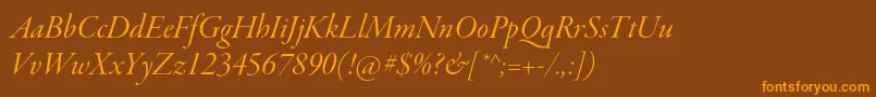 フォントGaramondpremrproItdisp – オレンジ色の文字が茶色の背景にあります。