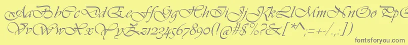 フォントVivaldiScript – 黄色の背景に灰色の文字