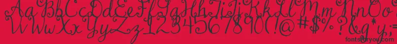 DjbDearMrClaus Font – Black Fonts on Red Background