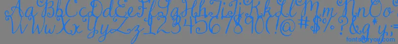 DjbDearMrClaus Font – Blue Fonts on Gray Background