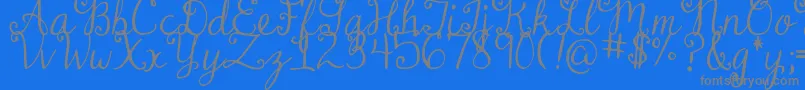 DjbDearMrClaus-Schriftart – Graue Schriften auf blauem Hintergrund