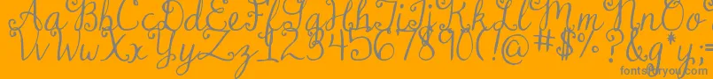 DjbDearMrClaus Font – Gray Fonts on Orange Background