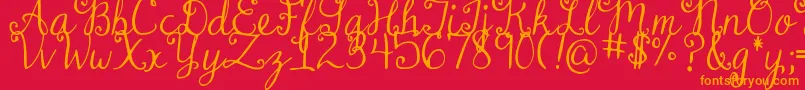 DjbDearMrClaus-Schriftart – Orangefarbene Schriften auf rotem Hintergrund