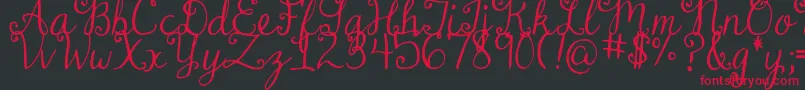 DjbDearMrClaus Font – Red Fonts on Black Background