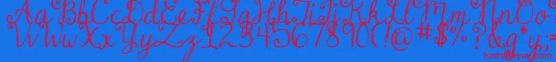 DjbDearMrClaus-Schriftart – Rote Schriften auf blauem Hintergrund