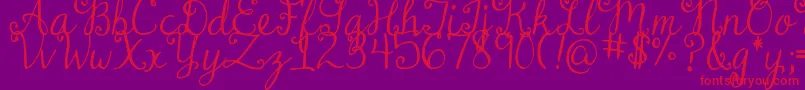 DjbDearMrClaus Font – Red Fonts on Purple Background