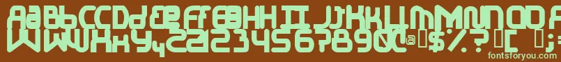 フォントElJayMixmixBold – 緑色の文字が茶色の背景にあります。