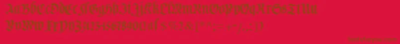 Cuxhavenfraktur-Schriftart – Braune Schriften auf rotem Hintergrund