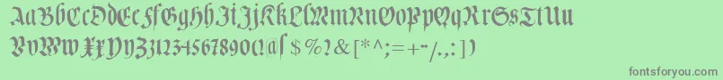 フォントCuxhavenfraktur – 緑の背景に灰色の文字