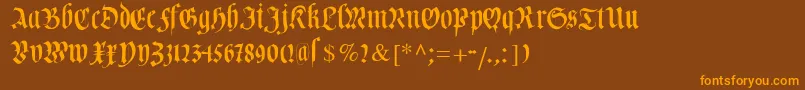 フォントCuxhavenfraktur – オレンジ色の文字が茶色の背景にあります。